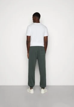 YOURTURN Oversized Unisex - Trainingsbroek -Dark Green -Kleding Verkoop 42776076c49c4d49984fa3254d41719b