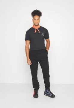 YOURTURN Unisex - Trainingsbroek - Black -Kleding Verkoop 4726d7ee4d5647f8a5f5c8ffe5554ff0